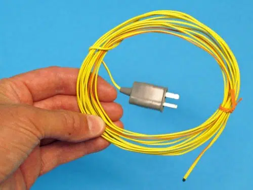 hand holding thermocouple for wireless temperature sensor