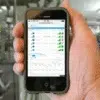 hand holding iPhone displaying Leap Sensors alert