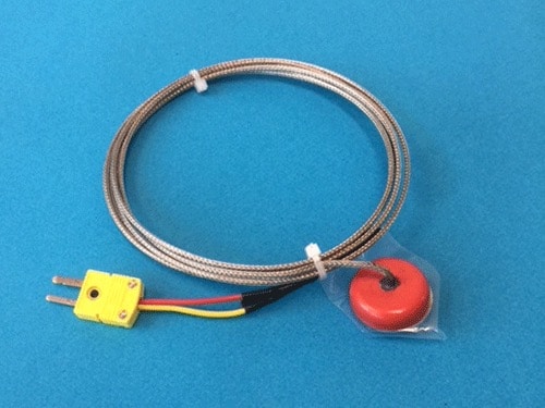 Magnetic k-type thermocouple for wireless temperature sensor