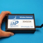 hand holding wireless sensor gateway from leap sensors