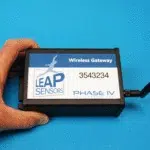 hand holding wireless sensor gateway from leap sensors
