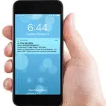 text-alert-home-screen-phone-in-hand
